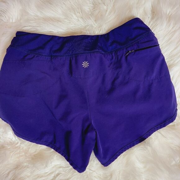 Athleta laser cutout hem purple 3" running shorts - Picture 7 of 10
